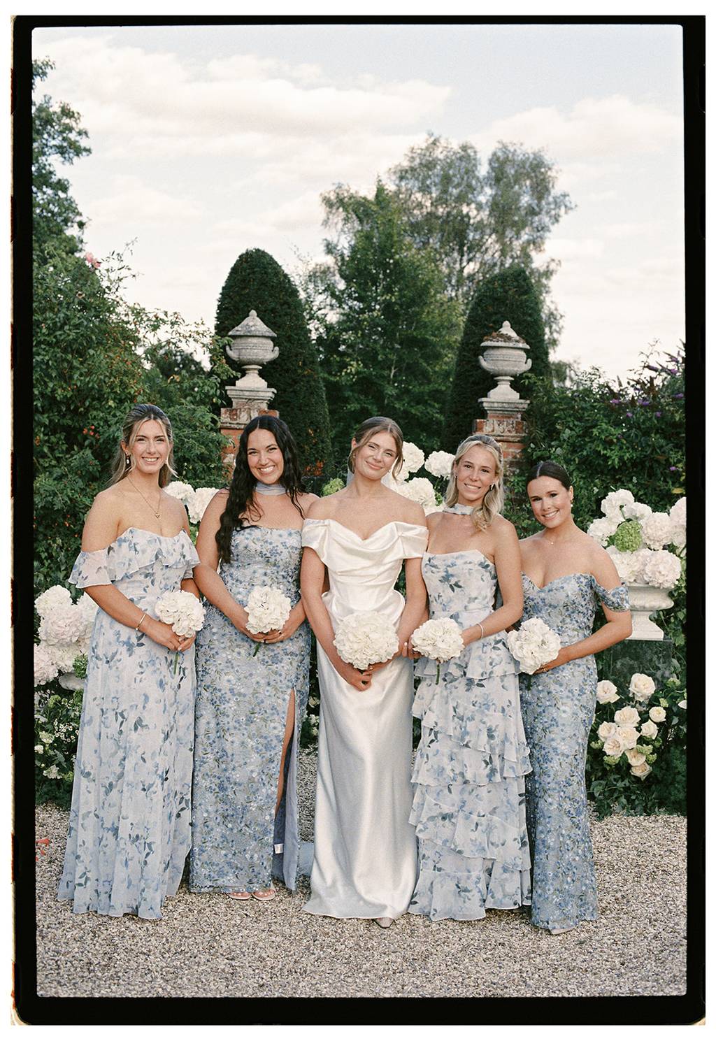 Bride Georgia's Floral Blue Mismatched Bridesmaids
