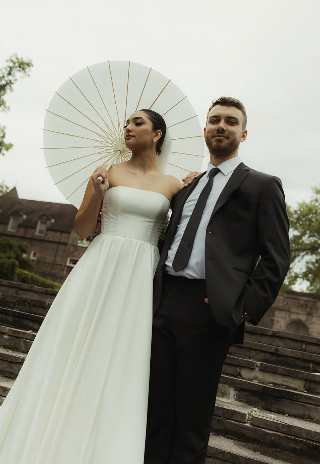 Elegant and Classic Brynn Strapless Gown on Bride Arianna